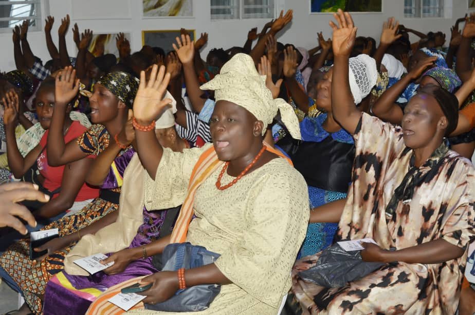 Community members responding during a Hand of Grace programme