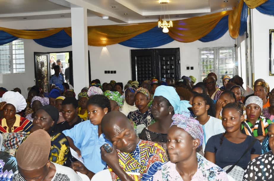 Community members gathered during a Hand of Grace outreach