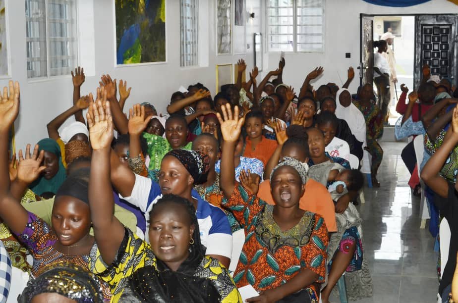 Community members engaging during a Hand of Grace programme
