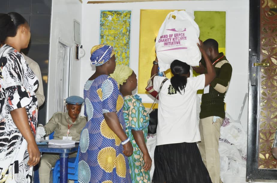 A Hand of Grace food pack being delivered during community outreach