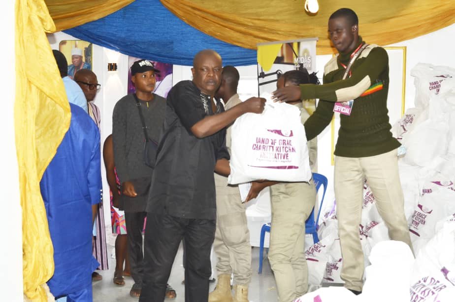 A community member receiving Hand of Grace food support