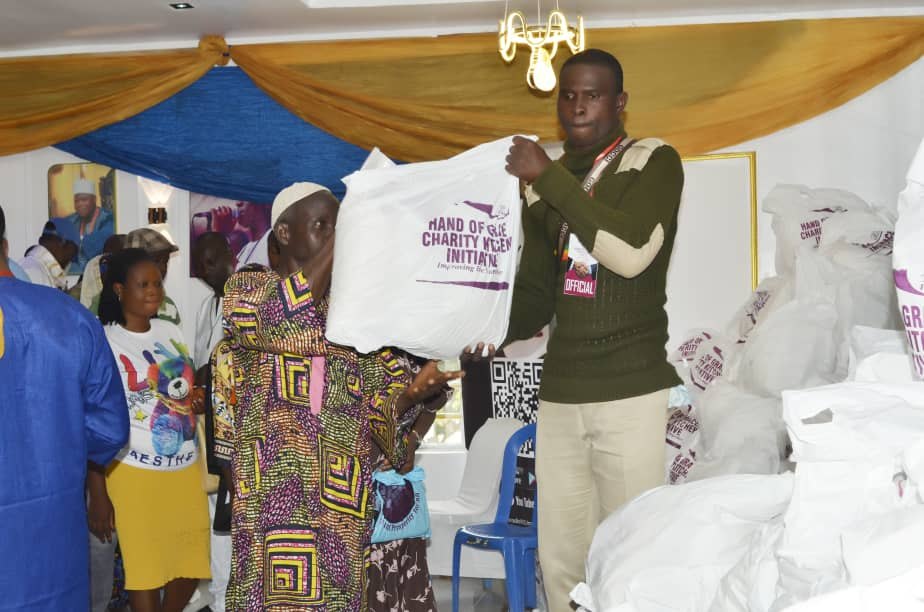 A community member receiving a Hand of Grace food pack