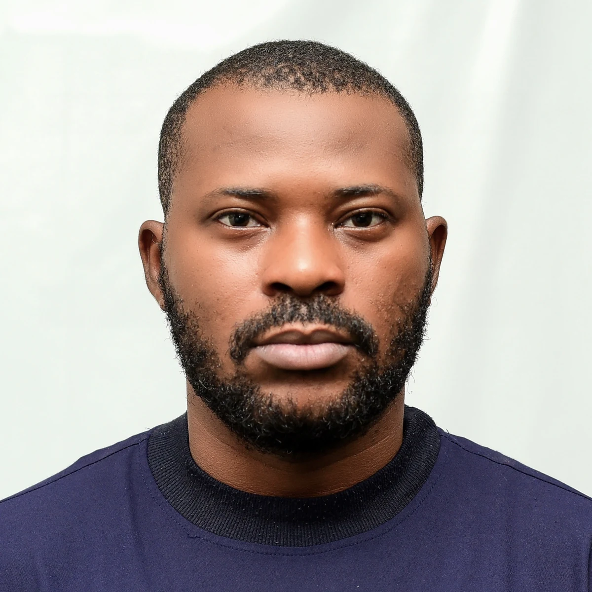 Portrait of Afolayan Opeyemi Ayomikun, Head of IT at Hand of Grace